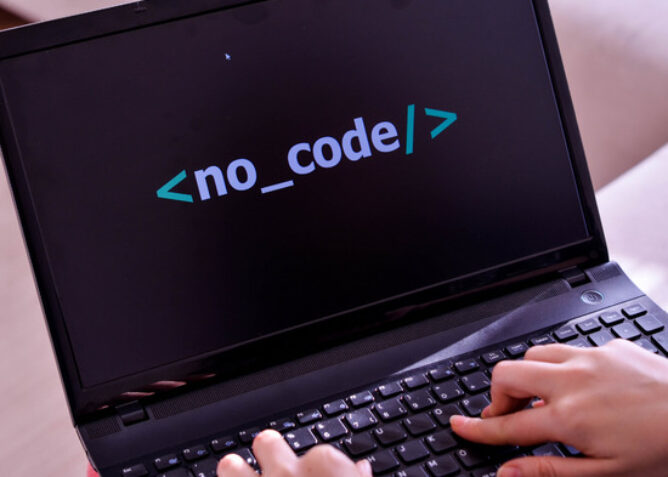 computer with the words no code displayed